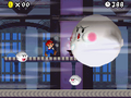 A screenshot of some Boos and a Balloon Boo in New Super Mario Bros.