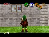 Link looking at some Hyrule Castle paintings