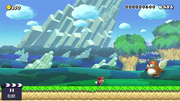 A screenshot of a big winged Monty Mole in a barebones New Super Mario Bros. U style custom stage in Super Mario Maker