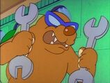 A Rocky Wrench holding two wrenches in the The Adventures of Super Mario Bros. 3 episode "Up, Up, and a Koopa"